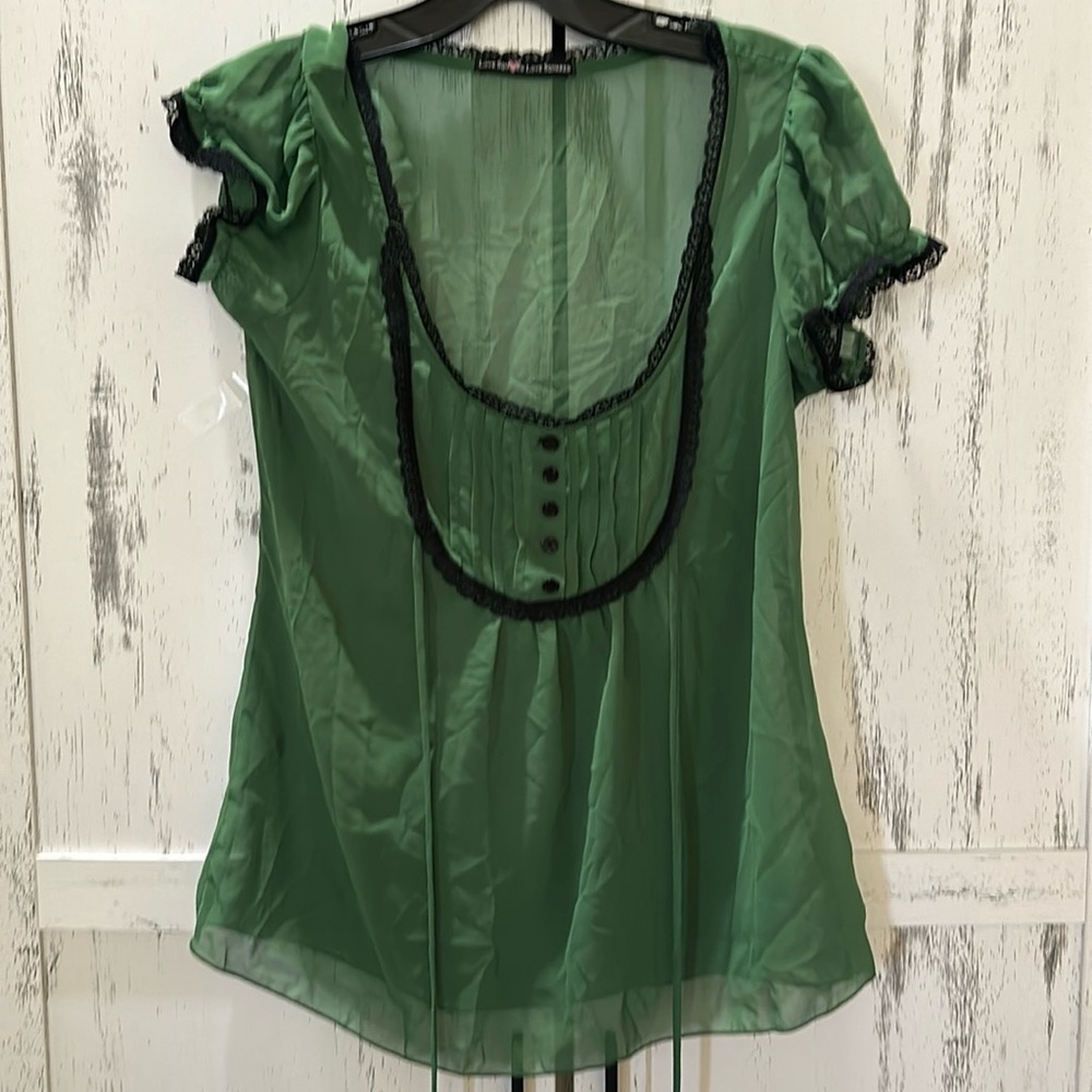 Lace trimmed green blouse